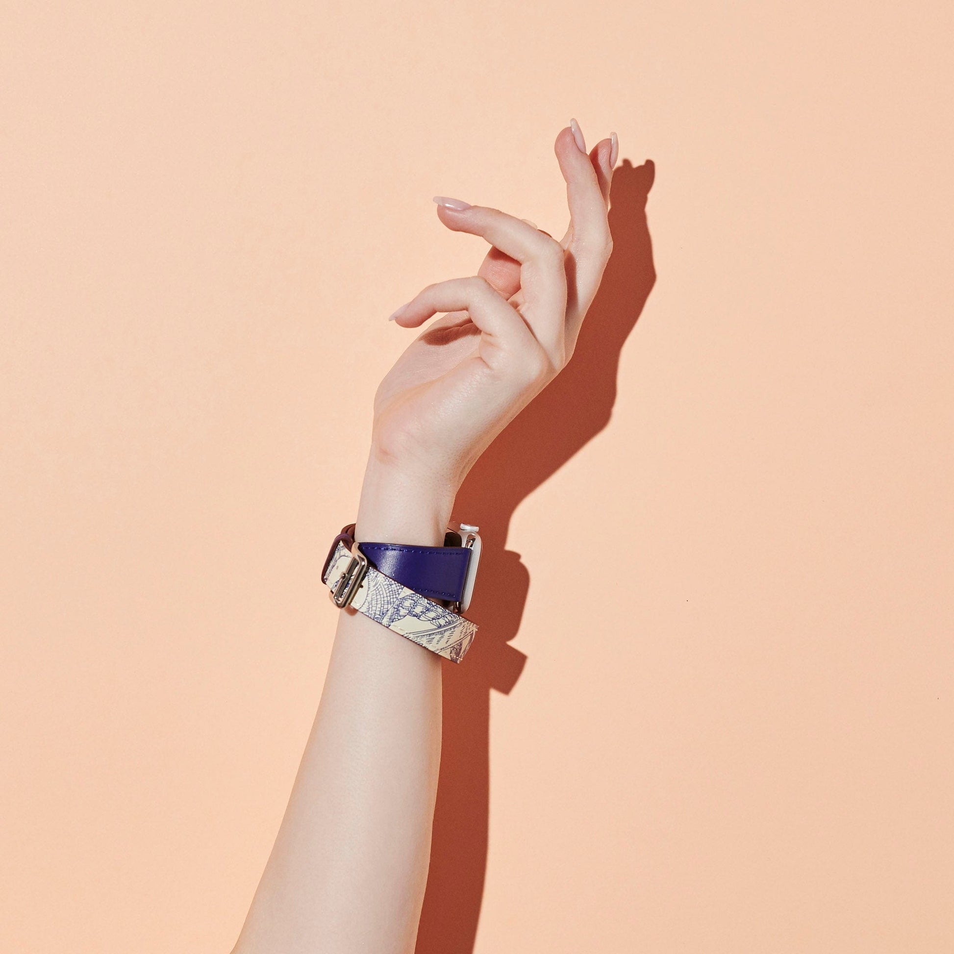 Apple Watch Hermès - Bracelet Simple Tour Jumping Bleu Saphir/Orange 44 mm  - Apple (FR)